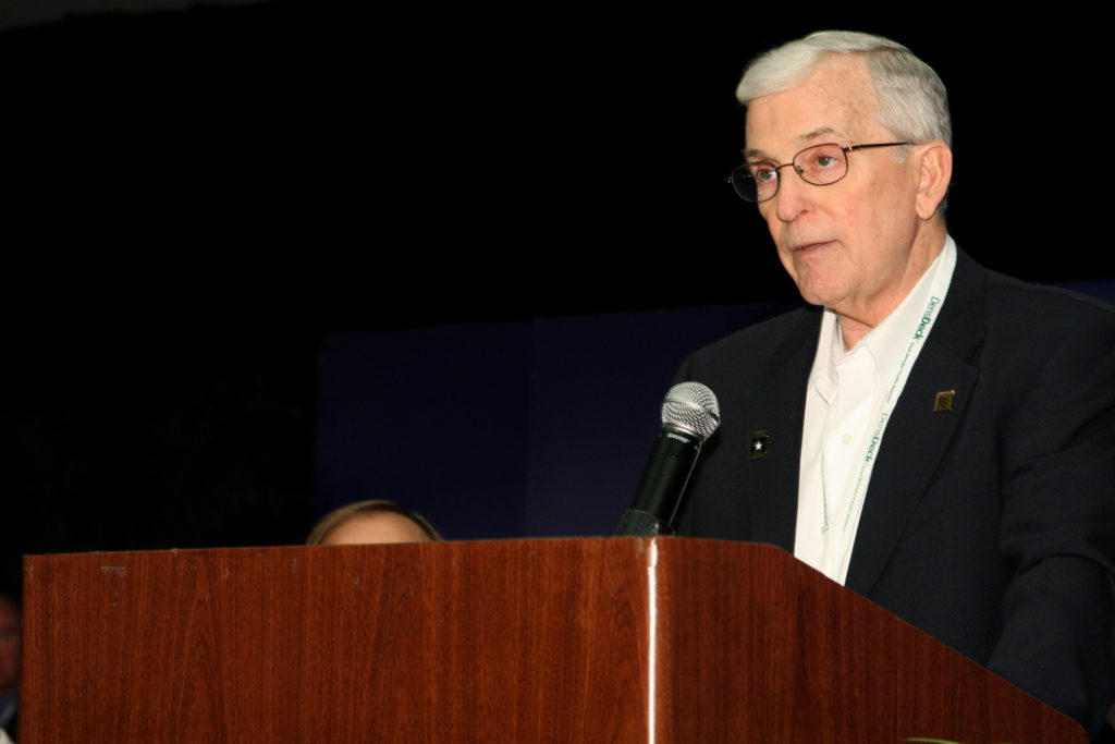 Don Bush announces new RRCs as chairman of the RRC Exam Development Subcommittee at the 2009 convention.