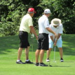 Three golfers