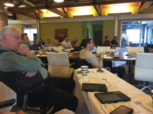 group listening to a speaker