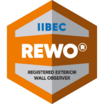 Orange and silver hexagonal badge for IIBEC's REWO credential.