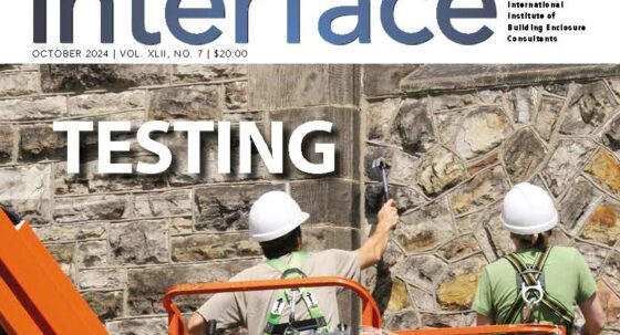 Cover of the October issue of IIBEC Interface showing workers in hardhats on the side of a building representing, 