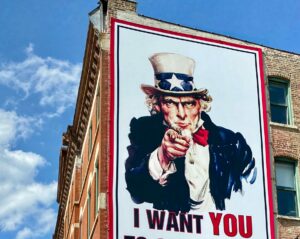 Image of a large Uncle Sam, "I Want You" sign, representing a need for volunteers in IIBEC chapters.