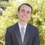 Brandon Hluchan in a shirt and tie