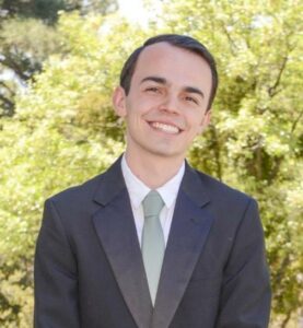Brandon Hluchan in a shirt and tie