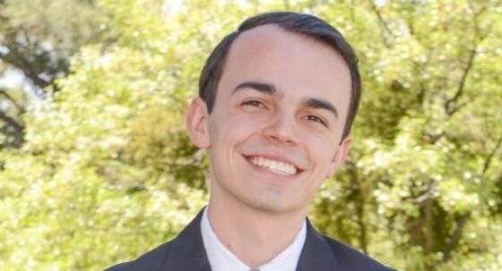 Brandon Hluchan in a shirt and tie