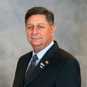 Headshot of IIBEC President Chris Dawkins.