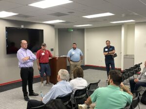A shot of speakers at the September 2025 IIBEC Georgia Chapter shows, from left to right: Mark Graham, Pierce Ward, Wes Riemenschneider, and Chris Dawkins.