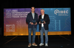 Jordan Beckner and Stephen Patterson holding their Horowitz Award.