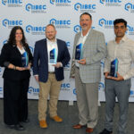 Holding their EBEC Awards, left to right, are Jennifer Hogan, Christopher Grey, Christopher Giffin, and Milirsan Pugalendiran.