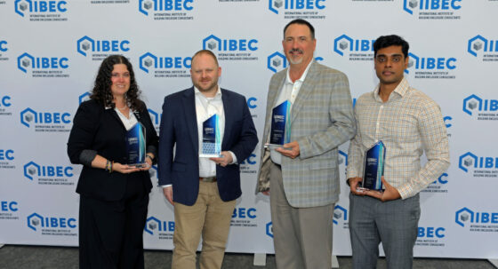 Holding their EBEC Awards, left to right, are Jennifer Hogan, Christopher Grey, Christopher Giffin, and Milirsan Pugalendiran.