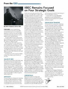 Magazine spread with a speaker at a podium on the left and the headline 'IIBEC Remains Focused on Four Strategic Goals' across three columns on the right. Caption reads 'By Brian Pallasch, EVP & CEO.'
