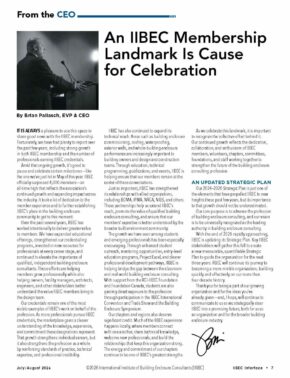 Article page with headline 'An IIBC Membership Landmark Is Cause for Celebration' and a man speaking at a podium in a black-and-white photo of a speech.