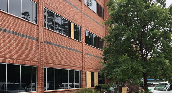 building with shuttered windows