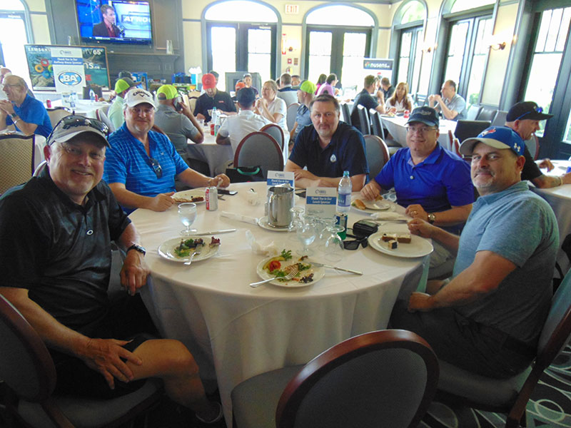 Golfers eating lunch