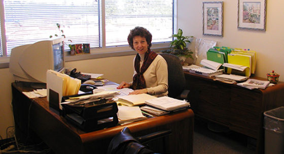 micki at a desk
