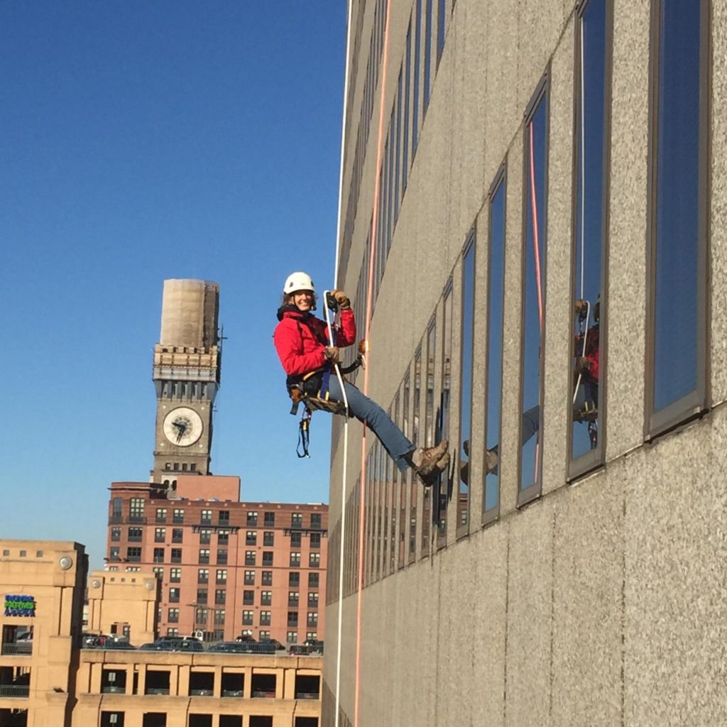 keegan hanging from a building